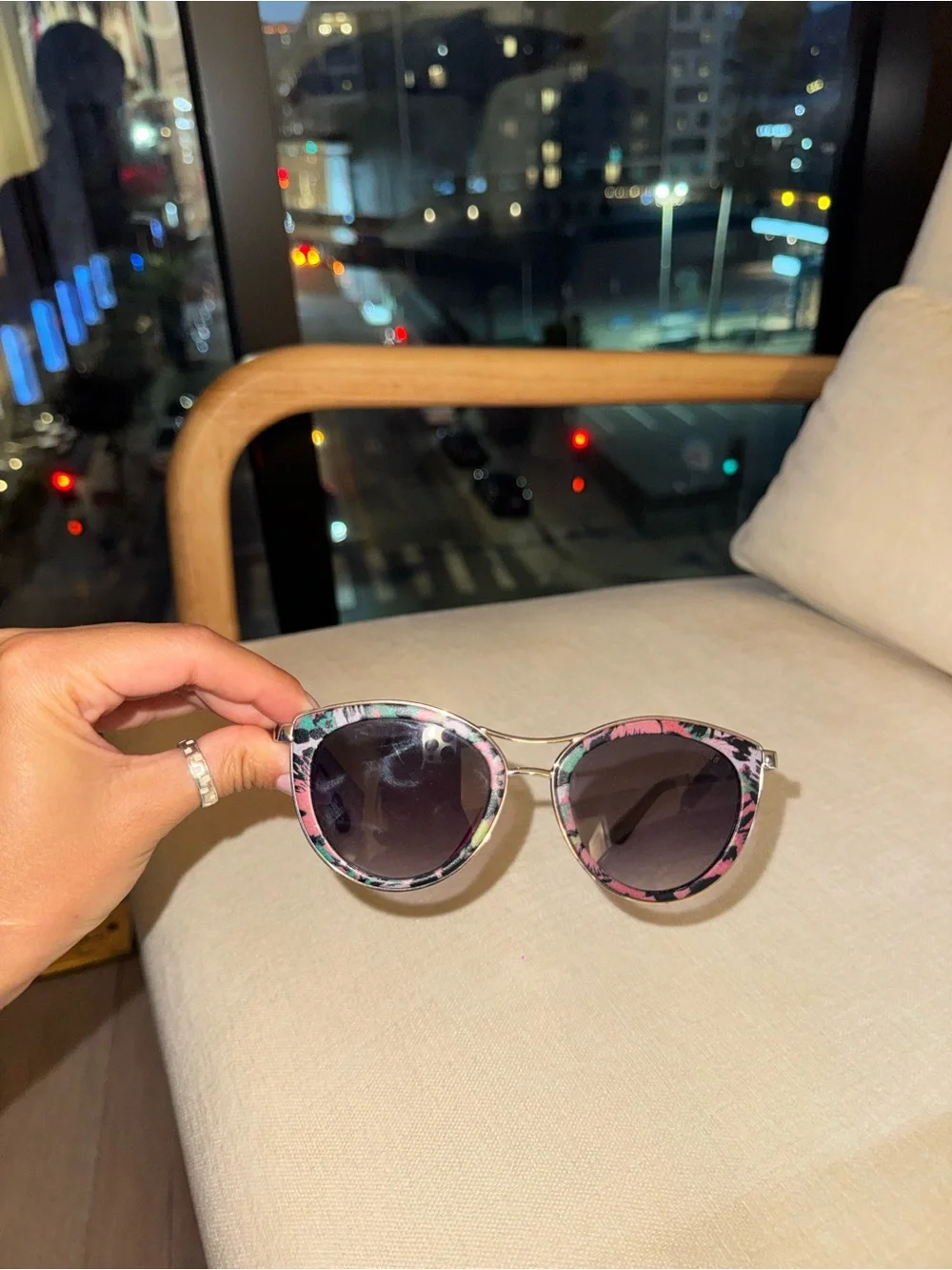 GUESS Pink Floral Cat-Eye Sunglasses with a silver bridge
